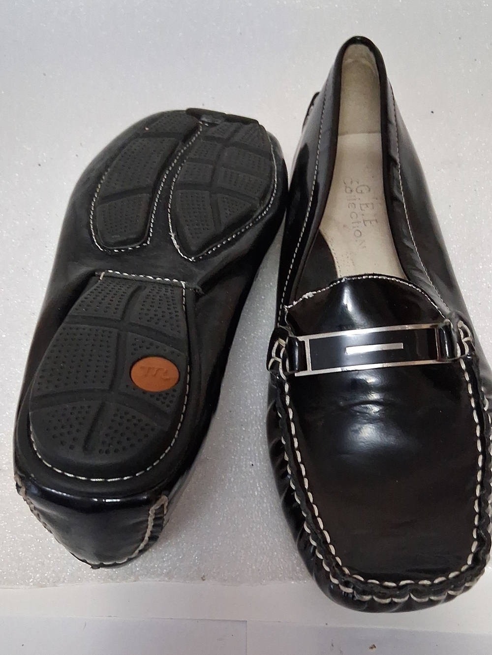 Women's Black Leather Slip-On Loafers with Silver Accent